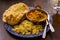 Mangalorean style roasted cauliflower and spinach curry with basmati rice and garlic naan bread, tasty vegetarian food