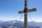 Mangart - Summit cross of majestic mountain peak Mangart (Mangrt) in Julian Alps, Friuli Venezia Giulia