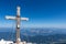 Mangart - Summit cross of majestic mountain peak Mangart (Mangrt) in Julian Alps, Friuli Venezia Giulia