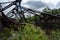 Mangled girders of the Kinzua Railroad Bridge after the tornado against the cloudy sky