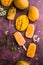 Mango banana popsicles with fresh fruits, flat lay top view