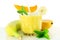 Mango banana smoothie with stevia and mint in pure white background