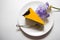 Mango cheesecake decorated with flowers 3