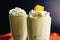 Mango Coconut Milkshakes Served in Fountain Glasses