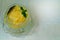 Mango compote or Mango in syrup is Thai dessert make by slide mango soak cool syrup with white background.Make fulfill in Thailan