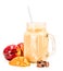 Mango milkshake in mason jar with blue and white drinking straw decorated with mango piece, two nectarines and chocolate isolated