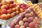 Mango and peaches fruit at the outdoor market.