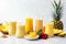 mango-pineapple smoothies in various glasses with different shapes