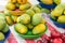 Mango and plums piled at the street market