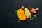 Mango, tamarind, avocado and rambutan. Fresh Tropical Fruits. On a wooden background.
