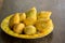 Mango wood floors, green leaves, yellow leaves.