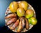 Mangoes and Kerala banana fruits in wooden plate