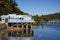 Mangonui harbour and fish shop on sunny summer day, New Zealand