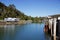 Mangonui harbour, wharf and fish shop on sunny summer day