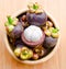 Mangosteen in bowl wooden