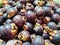 Mangosteen fruit on display for sale in a traditional market, closed