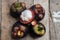 Mangosteen fruit on the wooden table