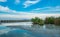 Mangrove forest, concrete bridge and beautiful blue sky and clouds.