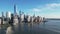 Manhattan aerial view from top. Forwards fly above street between modern buildings. Day in Manhattan, NYC aerial view