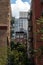 Manhattan Alley with Old Brick Skyscrapers with Fire Escapes and an Old Water Tower on the Upper West Side of New York City