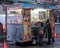 Manhattan, New York, NY, USA - Children buying some street food at the food stand.