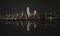 Manhattan at night, New York City skyline with reflection