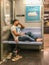 Manhattan, NY US - March 19, 2018 Homeless person sits in a subway car