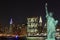 Manhattan Skyline and The Statue of Liberty at Night