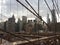 Manhattan skyline view from brookyn bridge at sunset