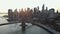Manhattan sunset beautiful cityscape view of Brooklyn Bridge on skyline Manhattan over East River at sunset, New York