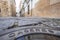 Manhole cover with inscription caceres in the old eponymous historic capital of the province of caceres, extremadura, spain