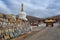 Mani Stones wall and chorten stupa of Tibetan Buddhism