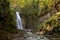 Maniavskyi waterfall in Maniava, Cascade in forest in mountains. Carpathian Mountains, Ivano-Frankivska oblast, Ukraine