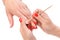 Manicure applying - cleaning the cuticles