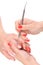 Manicure applying - cleaning the cuticles