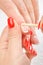 Manicure applying - cleaning the cuticles