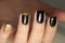 Manicure design black and gold color