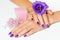 Manicure, flower, candle and beads