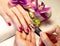 Manicure nail paint pink color