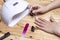 Manicure procedure. Woman Nail Polish. Shellac finger nails