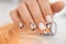 Manicure salon, nail design on shiny nail. Fashionable multicolored manicure. Professional manicure in beauty salon