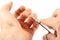 Manicure: scissors cutting nails