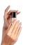 Manicured nails with natural nail polish. Manicure with beige nailpolish. Fashion manicure. Shiny gel lacquer in bottle