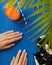 Manicured womans hands with summer clothes and accessories