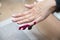 manicurist lengthens client& x27;s nails with acrylic builder gel sticker