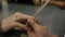 Manicurist makes manicure woman nail file