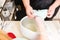 Manicurist Performing Paraffin Wax Treatment