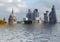 A manipulated conceptual image of the city of london with historic buildings flooded due to global warming and rising sea levels