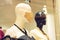 Mannequin with fashion face mask against covid 19 stand in a clothing store. Mannequins in the mall