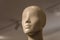 Mannequin head Head of a white mannequin at store background